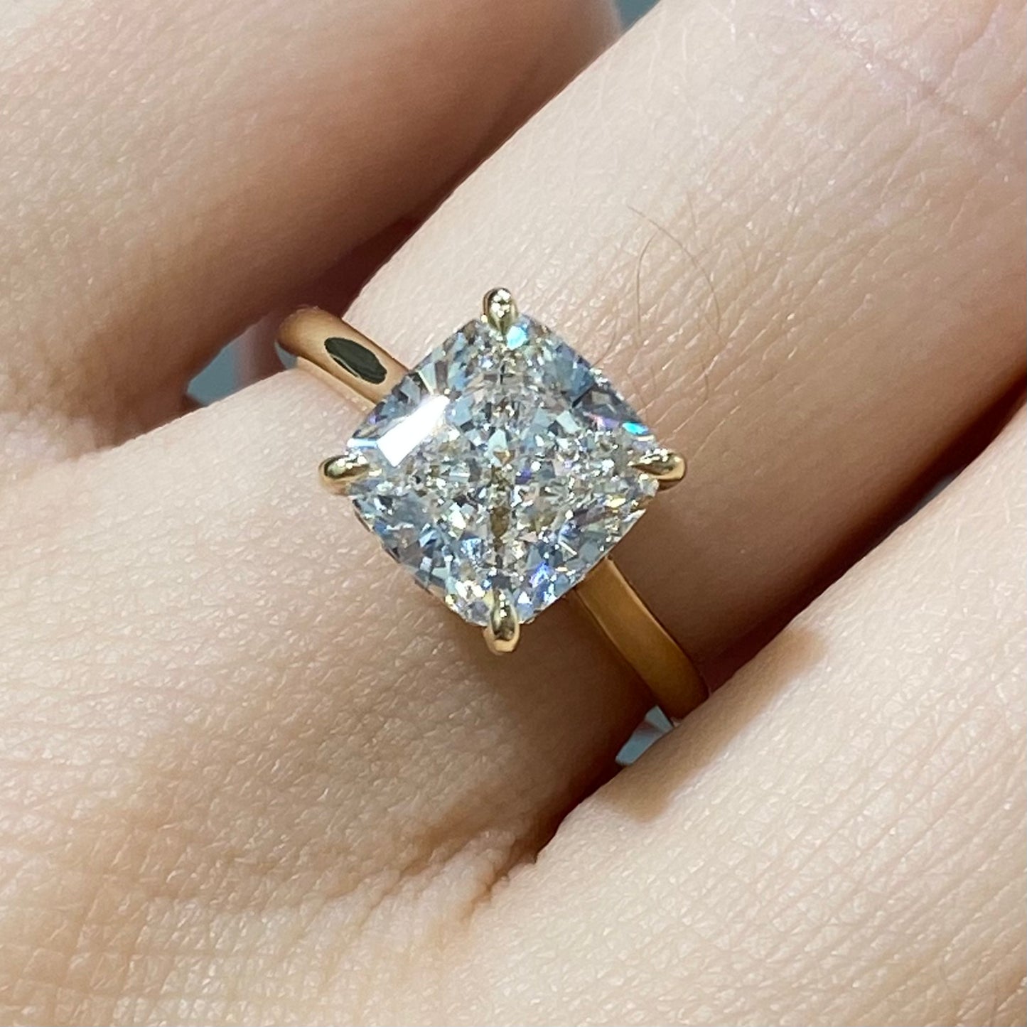 IGI diamond Cushion cut 3ct four-prong underhalo ring