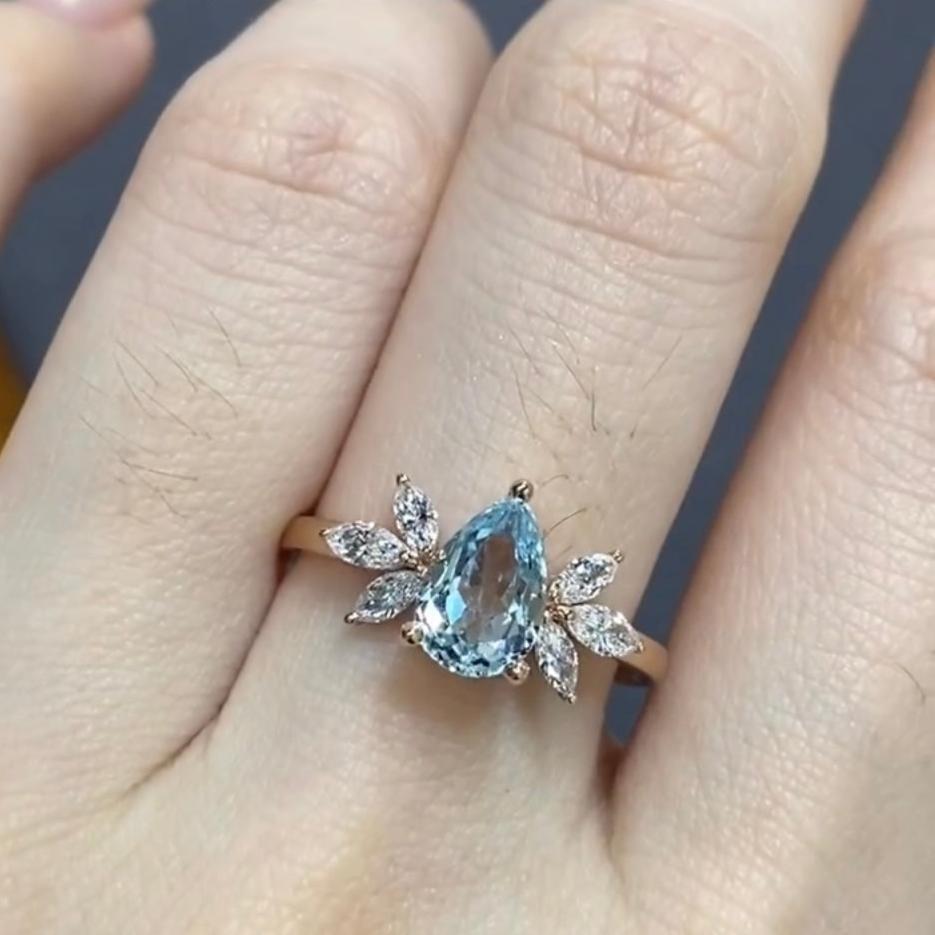 Lab sapphire Pear shape 1.5ct angel wings ring
